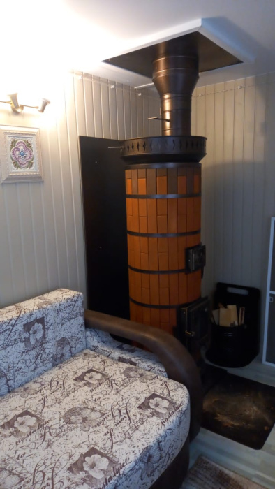 Печь отопительная "ЛАДУШКА" в кирпичной облицовке Керма